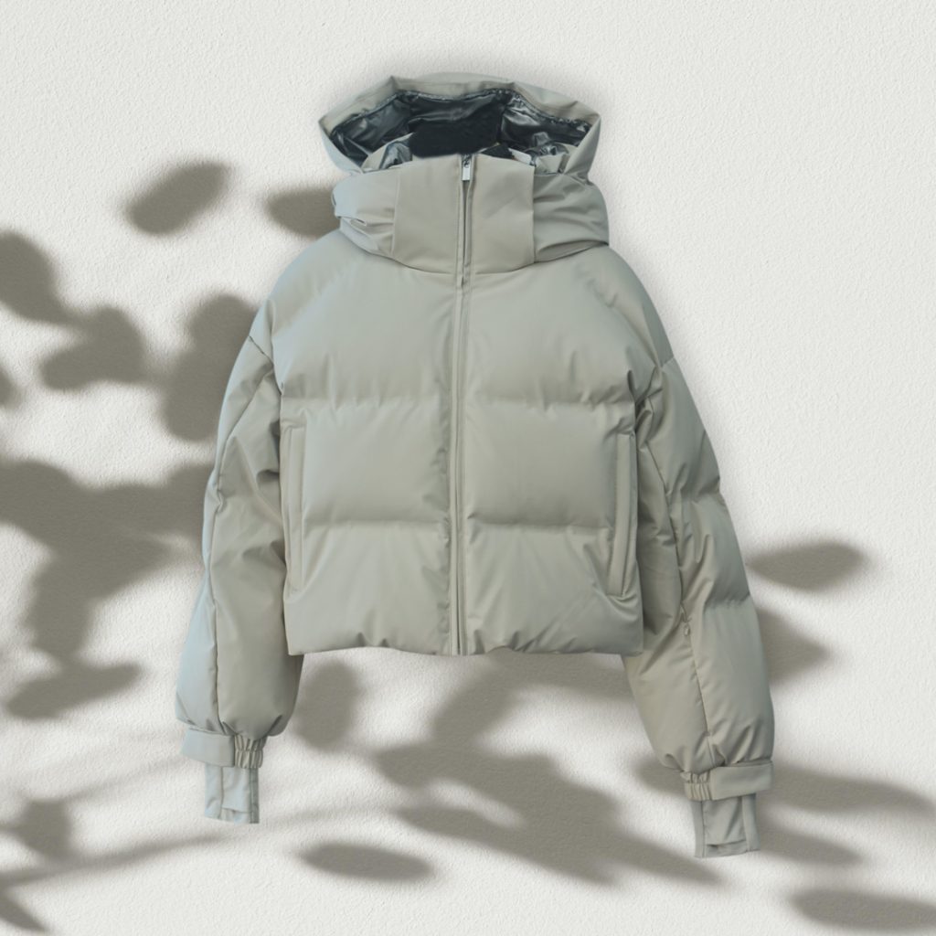 Women's down insulated jacket in cream colorway.