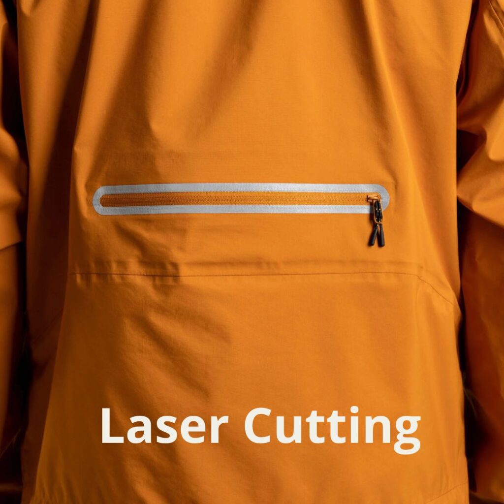 A part of a jacket showing a lazer-cut zip enclosure contour.