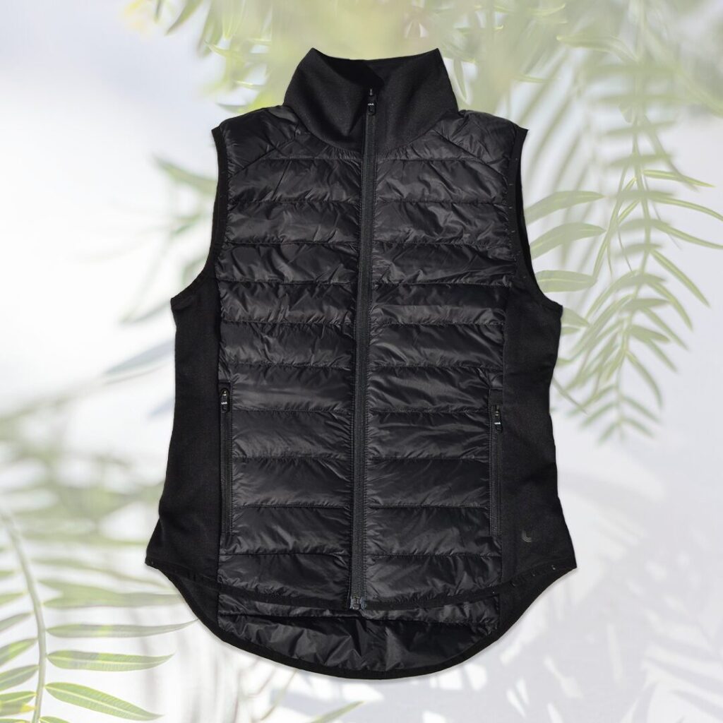 Partially insulated vest in black colorway.
