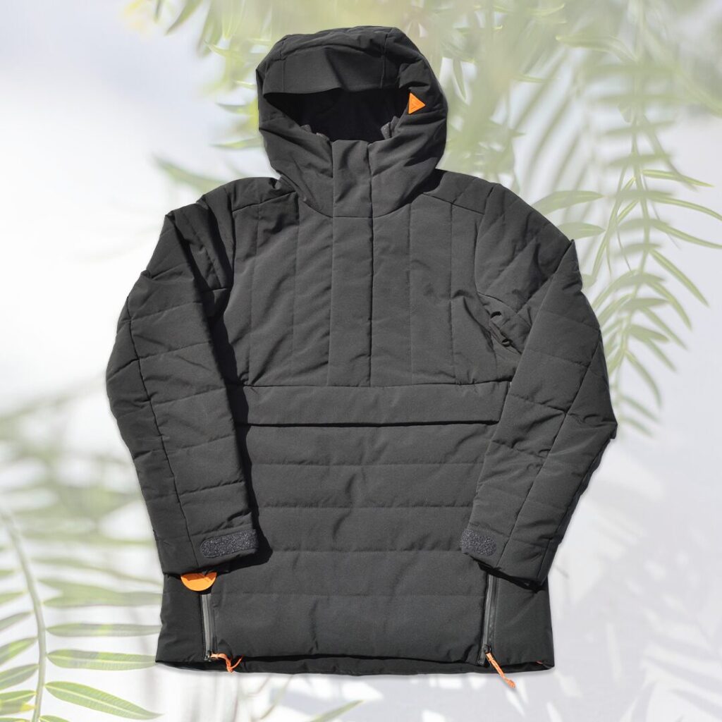 Insulated winter pullover jacket with linear perpendicular quilting in black colorway.