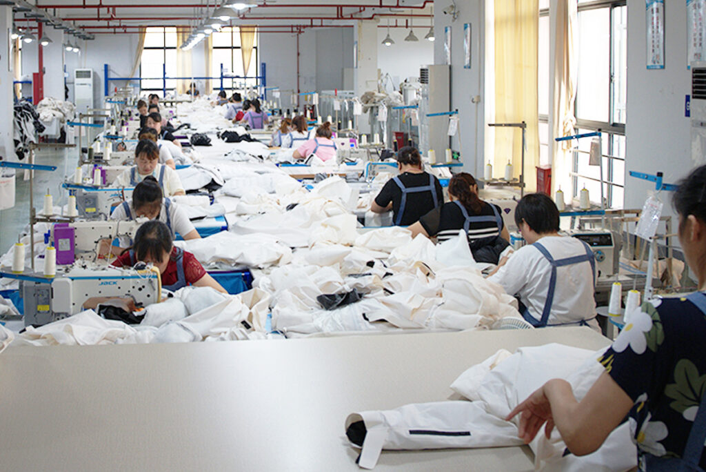 Itorch Apparel's factory has several sewing line where many professional operators pit the finishing touches on garments.