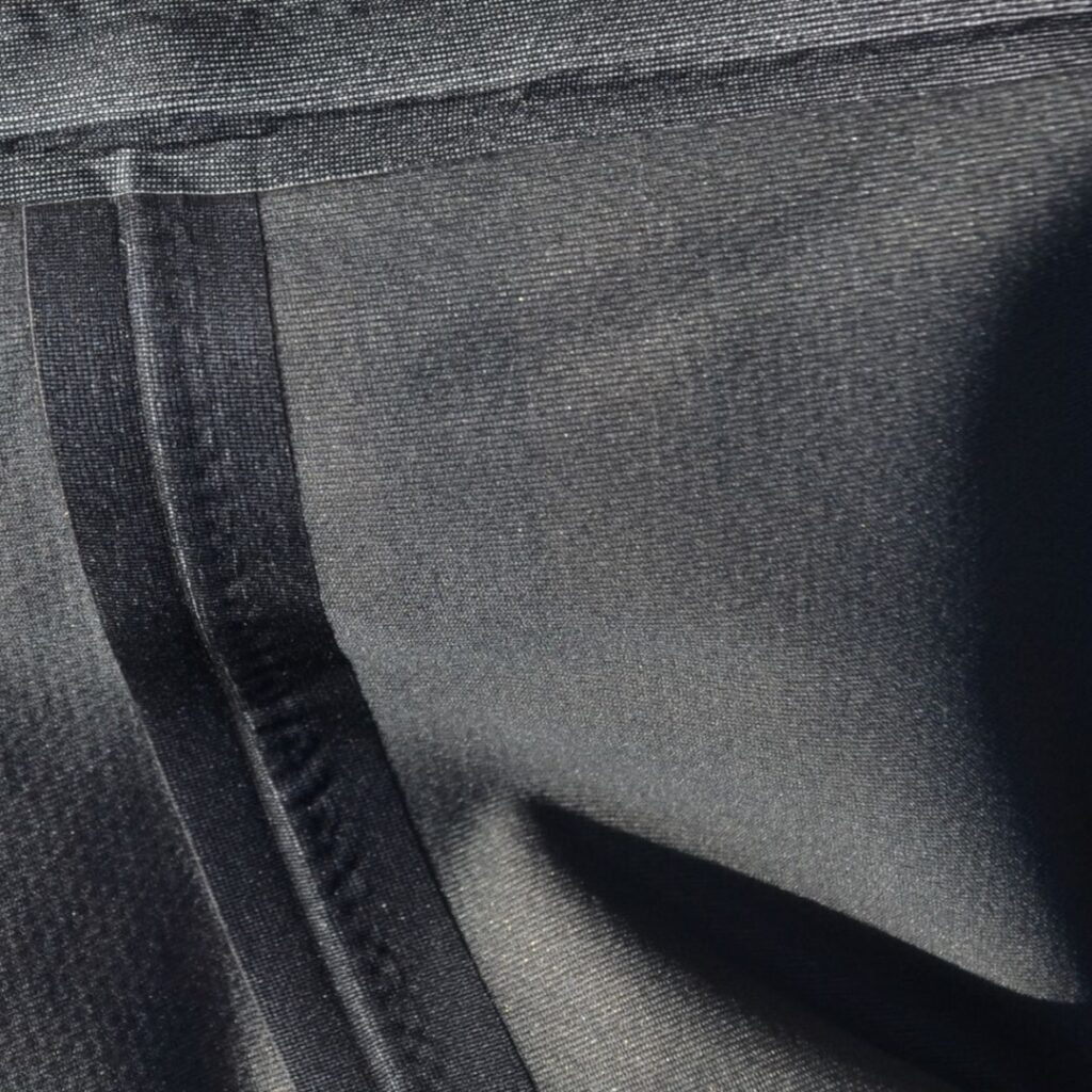 The interior of a waterproof breathable jacket showing sealed seams.