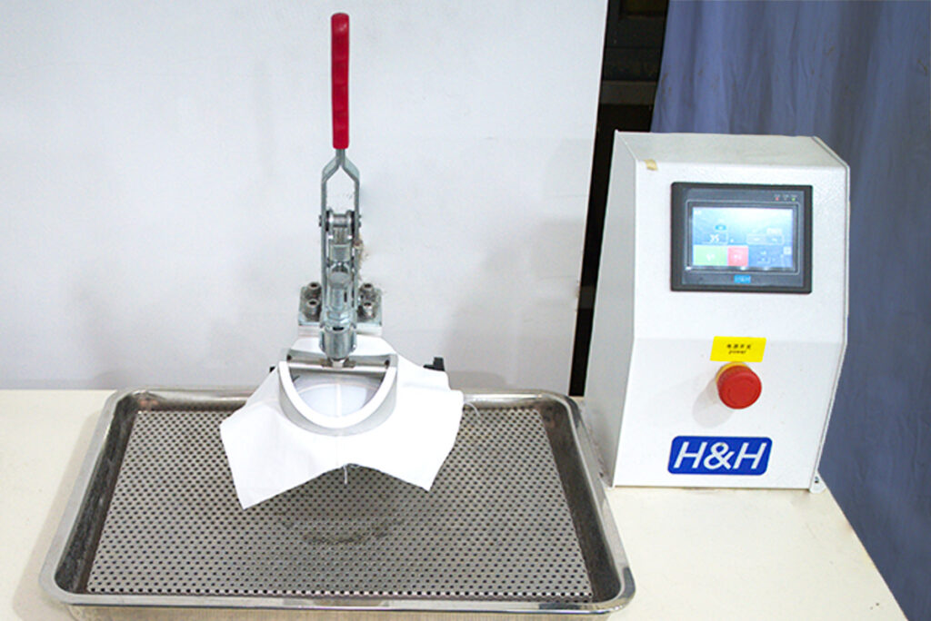 A waterproof seam testing machine used in Itorch apparel's quality control process.